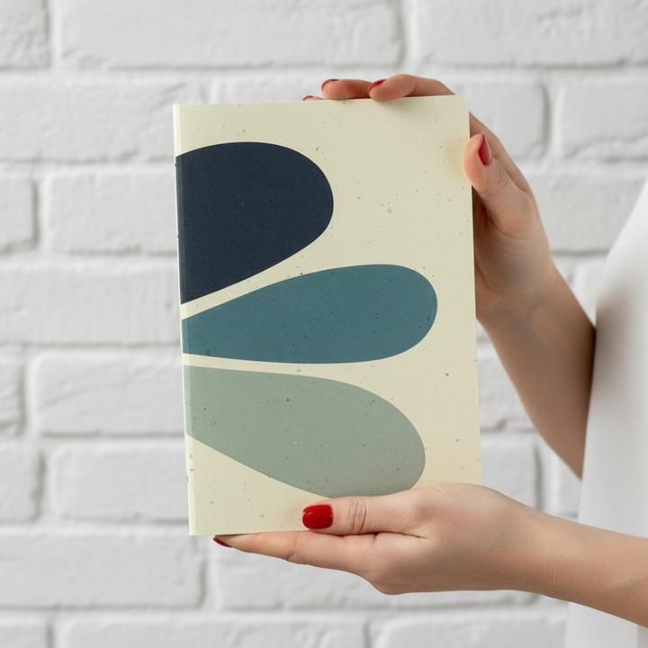 Make the notebook 10% smaller; make the background a white-painted brick wall